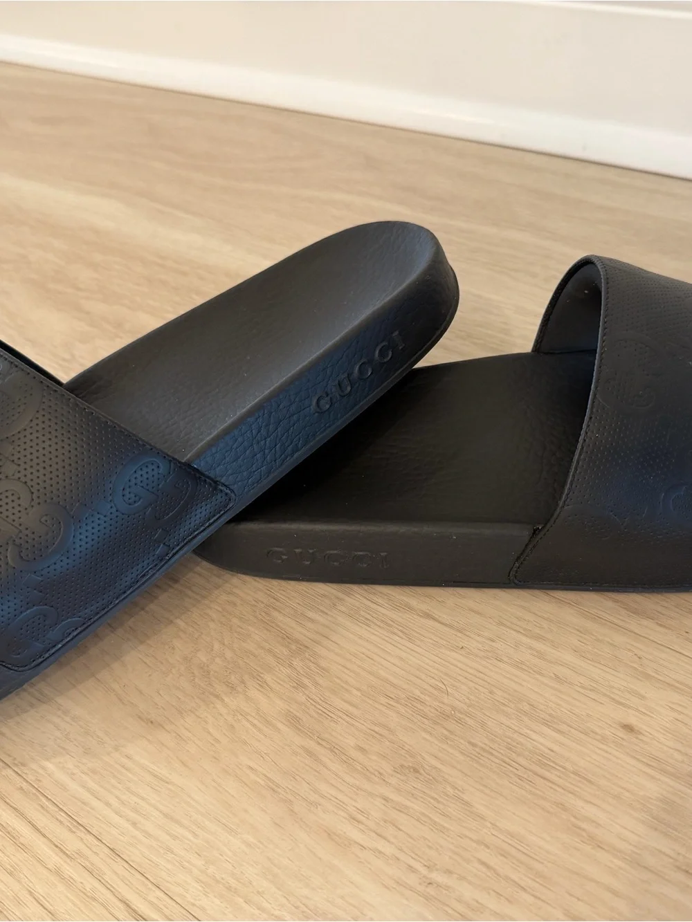 Men’s Gucci Black Embossed GG Slide Sandals